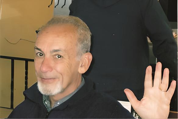 Rabbi Michael Leipziger, who waves at the camera.